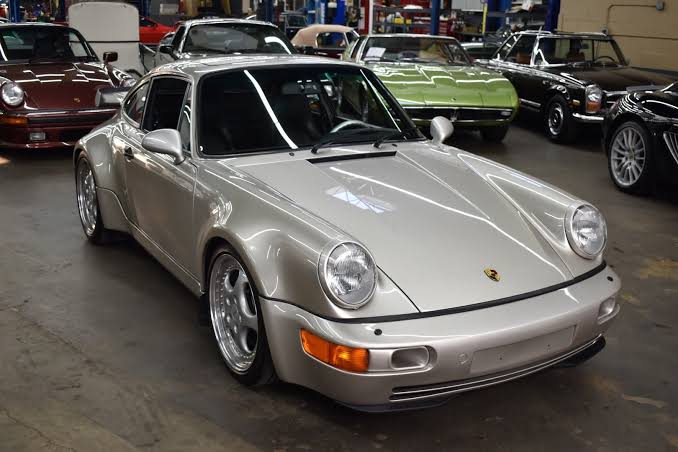 1991 Porsche 911 Turbo (964) - Known for its distinctive styling and performance, this model remains highly desirable among collectors.